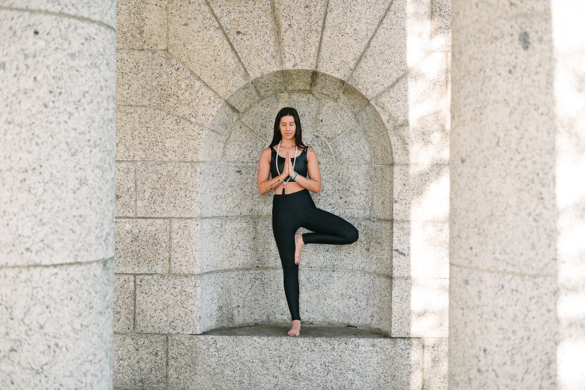 Woman standing in yoga position